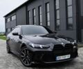 Черный БМВ i4, объемом двигателя 0 л и пробегом 60 тыс. км за 37500 $, фото 1 на Automoto.ua