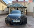 Черный БМВ i4, объемом двигателя 0 л и пробегом 71 тыс. км за 35499 $, фото 1 на Automoto.ua