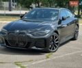 Черный БМВ i4, объемом двигателя 0 л и пробегом 31 тыс. км за 37000 $, фото 1 на Automoto.ua