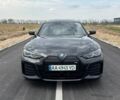 Черный БМВ i4, объемом двигателя 0 л и пробегом 24 тыс. км за 47000 $, фото 1 на Automoto.ua