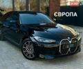 Черный БМВ i4, объемом двигателя 0 л и пробегом 48 тыс. км за 33500 $, фото 1 на Automoto.ua