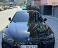 Черный БМВ i4, объемом двигателя 0 л и пробегом 18 тыс. км за 33800 $, фото 1 на Automoto.ua