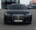Черный БМВ i4, объемом двигателя 0 л и пробегом 40 тыс. км за 33200 $, фото 1 на Automoto.ua