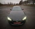 Черный БМВ i4, объемом двигателя 0 л и пробегом 38 тыс. км за 31500 $, фото 1 на Automoto.ua