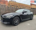 Черный БМВ i4, объемом двигателя 0 л и пробегом 19 тыс. км за 33999 $, фото 1 на Automoto.ua