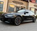 Черный БМВ i4, объемом двигателя 0 л и пробегом 40 тыс. км за 39900 $, фото 1 на Automoto.ua