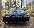 Черный БМВ i4, объемом двигателя 0 л и пробегом 4 тыс. км за 38000 $, фото 1 на Automoto.ua