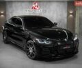 Черный БМВ i4, объемом двигателя 0 л и пробегом 24 тыс. км за 27900 $, фото 1 на Automoto.ua
