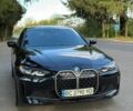 Черный БМВ i4, объемом двигателя 0 л и пробегом 40 тыс. км за 29000 $, фото 1 на Automoto.ua