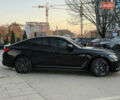 Черный БМВ i4, объемом двигателя 0 л и пробегом 17 тыс. км за 31999 $, фото 2 на Automoto.ua