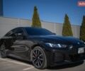 Черный БМВ i4, объемом двигателя 0 л и пробегом 13 тыс. км за 37000 $, фото 1 на Automoto.ua