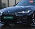 Черный БМВ i4, объемом двигателя 0 л и пробегом 9 тыс. км за 48500 $, фото 1 на Automoto.ua