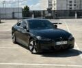 Черный БМВ i4, объемом двигателя 0 л и пробегом 16 тыс. км за 44000 $, фото 1 на Automoto.ua