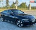 Черный БМВ i4, объемом двигателя 0 л и пробегом 24 тыс. км за 37500 $, фото 1 на Automoto.ua