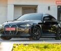 Черный БМВ i4, объемом двигателя 0 л и пробегом 22 тыс. км за 32400 $, фото 1 на Automoto.ua