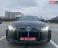Черный БМВ i4, объемом двигателя 0 л и пробегом 10 тыс. км за 35400 $, фото 1 на Automoto.ua