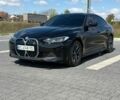 Черный БМВ i4, объемом двигателя 0 л и пробегом 6 тыс. км за 32300 $, фото 1 на Automoto.ua