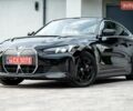 Черный БМВ i4, объемом двигателя 0 л и пробегом 51 тыс. км за 33700 $, фото 1 на Automoto.ua