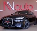 Черный БМВ i4, объемом двигателя 0 л и пробегом 20 тыс. км за 31900 $, фото 1 на Automoto.ua