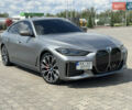 Серый БМВ i4, объемом двигателя 0 л и пробегом 28 тыс. км за 50500 $, фото 1 на Automoto.ua
