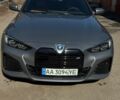 Серый БМВ i4, объемом двигателя 0 л и пробегом 28 тыс. км за 29500 $, фото 1 на Automoto.ua