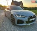 Серый БМВ i4, объемом двигателя 0 л и пробегом 36 тыс. км за 45999 $, фото 1 на Automoto.ua