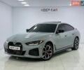 Серый БМВ i4, объемом двигателя 0 л и пробегом 20 тыс. км за 42990 $, фото 1 на Automoto.ua