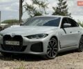 Серый БМВ i4, объемом двигателя 0 л и пробегом 55 тыс. км за 34700 $, фото 1 на Automoto.ua