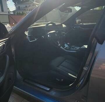 Серый БМВ i4, объемом двигателя 0 л и пробегом 35 тыс. км за 34300 $, фото 4 на Automoto.ua