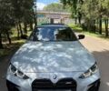 Серый БМВ i4, объемом двигателя 0 л и пробегом 33 тыс. км за 45000 $, фото 1 на Automoto.ua
