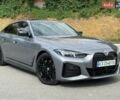 Серый БМВ i4, объемом двигателя 0 л и пробегом 5 тыс. км за 40900 $, фото 1 на Automoto.ua