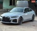 Серый БМВ i4, объемом двигателя 0 л и пробегом 2 тыс. км за 47940 $, фото 1 на Automoto.ua