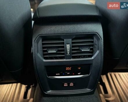 Серый БМВ i4, объемом двигателя 0 л и пробегом 25 тыс. км за 47500 $, фото 52 на Automoto.ua