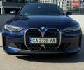 Синий БМВ i4, объемом двигателя 0 л и пробегом 34 тыс. км за 29900 $, фото 1 на Automoto.ua