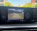 Синий БМВ i4, объемом двигателя 0 л и пробегом 75 тыс. км за 32999 $, фото 2 на Automoto.ua