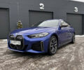Синий БМВ i4, объемом двигателя 0 л и пробегом 52 тыс. км за 45000 $, фото 1 на Automoto.ua