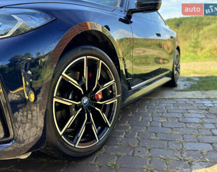 Синий БМВ i4, объемом двигателя 0 л и пробегом 44 тыс. км за 36350 $, фото 2 на Automoto.ua