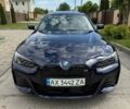 Синий БМВ i4, объемом двигателя 0 л и пробегом 32 тыс. км за 38900 $, фото 1 на Automoto.ua