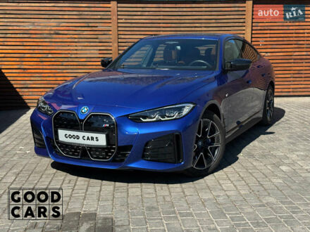 Синий БМВ i4, объемом двигателя 0 л и пробегом 2 тыс. км за 58000 $, фото 1 на Automoto.ua