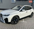 Белый БМВ iX, объемом двигателя 0 л и пробегом 19 тыс. км за 80000 $, фото 1 на Automoto.ua