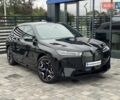 Черный БМВ iX, объемом двигателя 0 л и пробегом 37 тыс. км за 77900 $, фото 1 на Automoto.ua