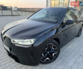 Черный БМВ iX, объемом двигателя 0 л и пробегом 56 тыс. км за 45555 $, фото 1 на Automoto.ua