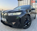 Черный БМВ iX, объемом двигателя 0 л и пробегом 56 тыс. км за 45555 $, фото 1 на Automoto.ua