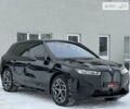 Черный БМВ iX, объемом двигателя 0 л и пробегом 24 тыс. км за 73499 $, фото 1 на Automoto.ua