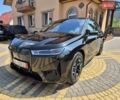 Черный БМВ iX, объемом двигателя 0 л и пробегом 43 тыс. км за 65900 $, фото 1 на Automoto.ua