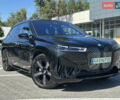 Черный БМВ iX, объемом двигателя 0 л и пробегом 14 тыс. км за 51999 $, фото 1 на Automoto.ua