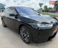 Черный БМВ iX, объемом двигателя 0 л и пробегом 3 тыс. км за 57900 $, фото 1 на Automoto.ua