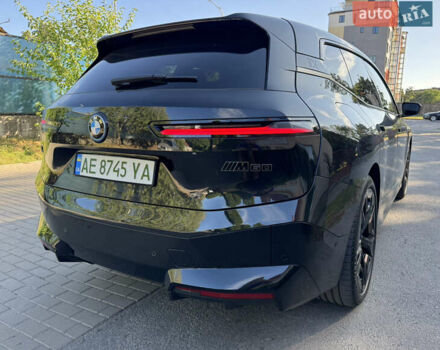 Черный БМВ iX, объемом двигателя 0 л и пробегом 5 тыс. км за 93532 $, фото 12 на Automoto.ua