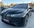 Черный БМВ iX, объемом двигателя 0 л и пробегом 14 тыс. км за 67300 $, фото 1 на Automoto.ua