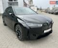 Черный БМВ iX, объемом двигателя 0 л и пробегом 22 тыс. км за 68000 $, фото 1 на Automoto.ua